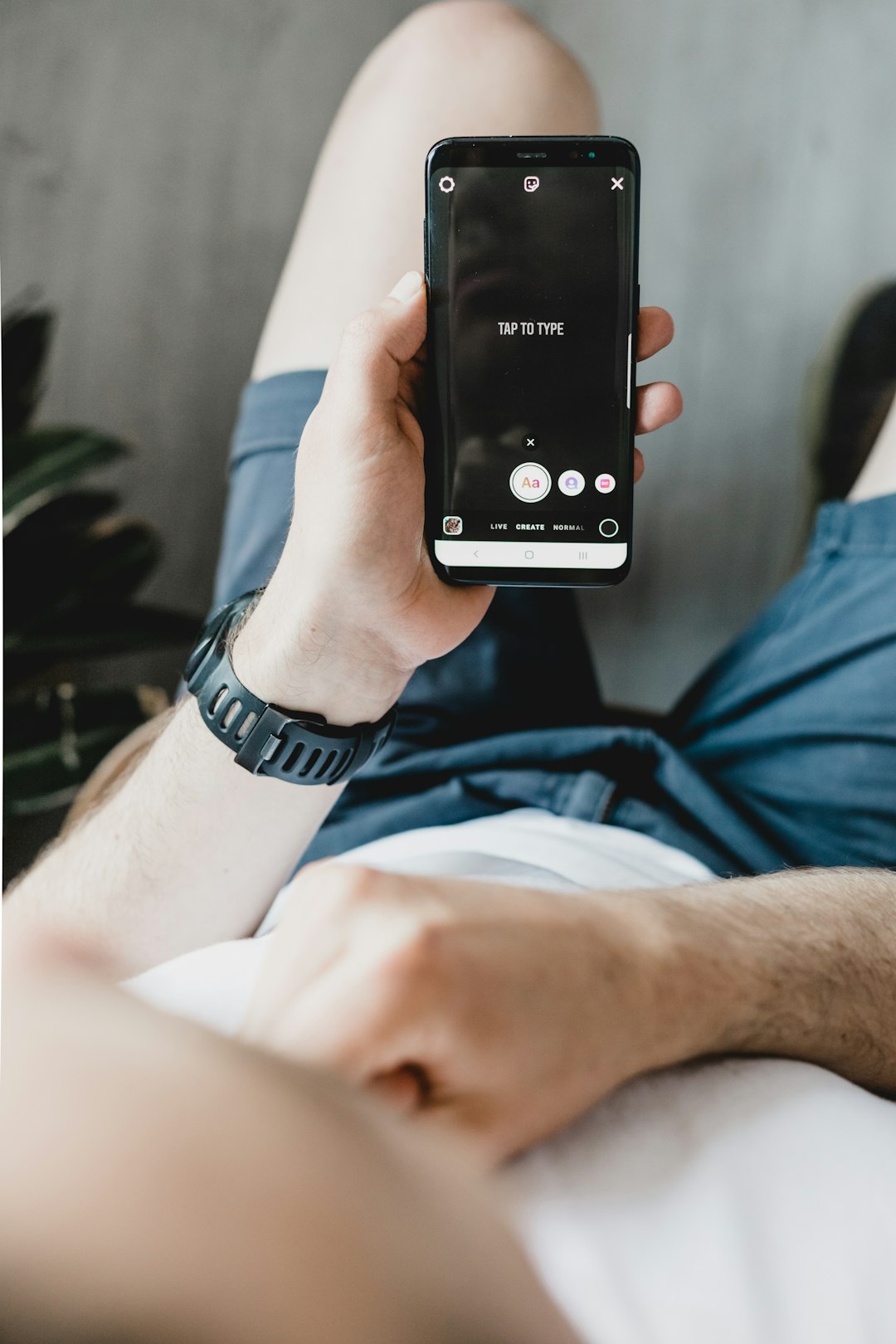 person holding black android smartphone person holding black android smartphone